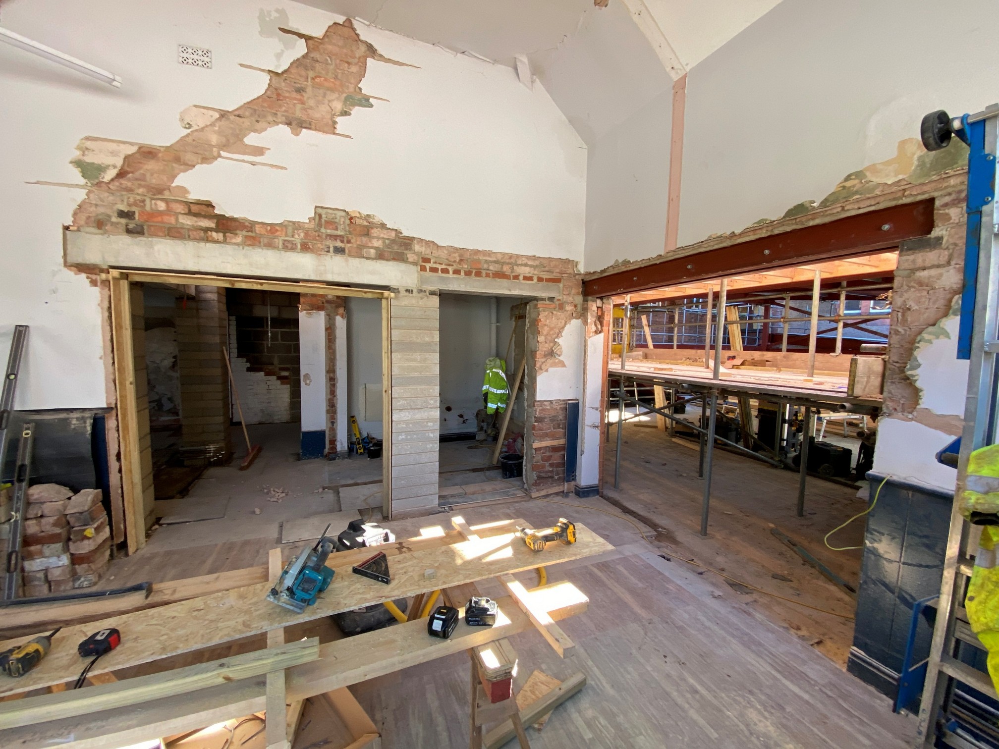 In the Cornerstone, walls have been reconfigured and the opening into the foyer has been made, together with the opening for the new servery and the accessible toilet.