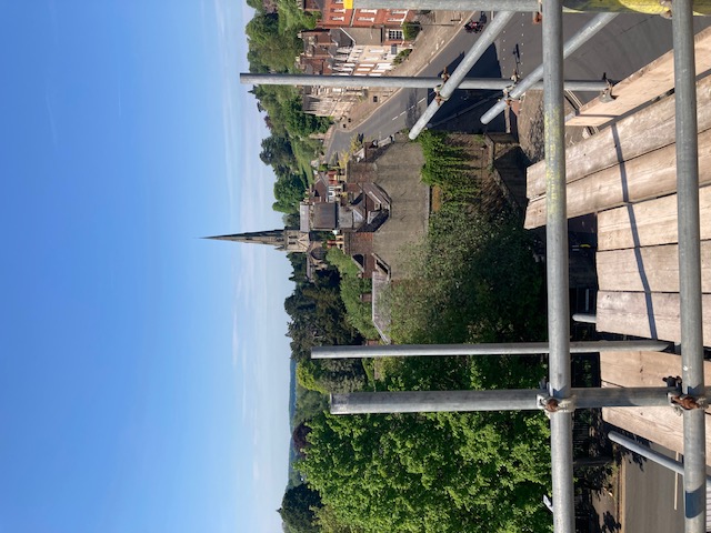 A view from the roof of Ashbourne Methodist Church looking along Church Street towards St Oswald's Church and the former Queen Elizabeth's Grammar School building.