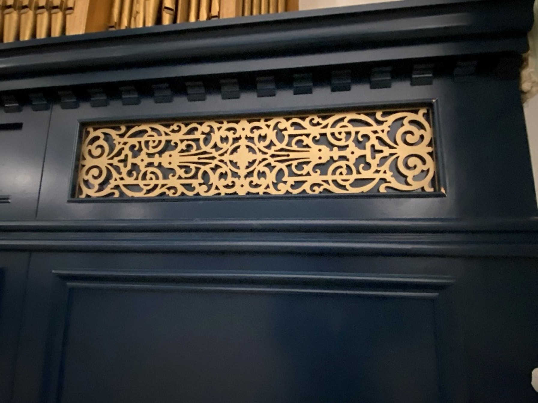 The new organ panelling is in place, and we can see the first fretwork panel – all designed to reflect the panelling on the balcony