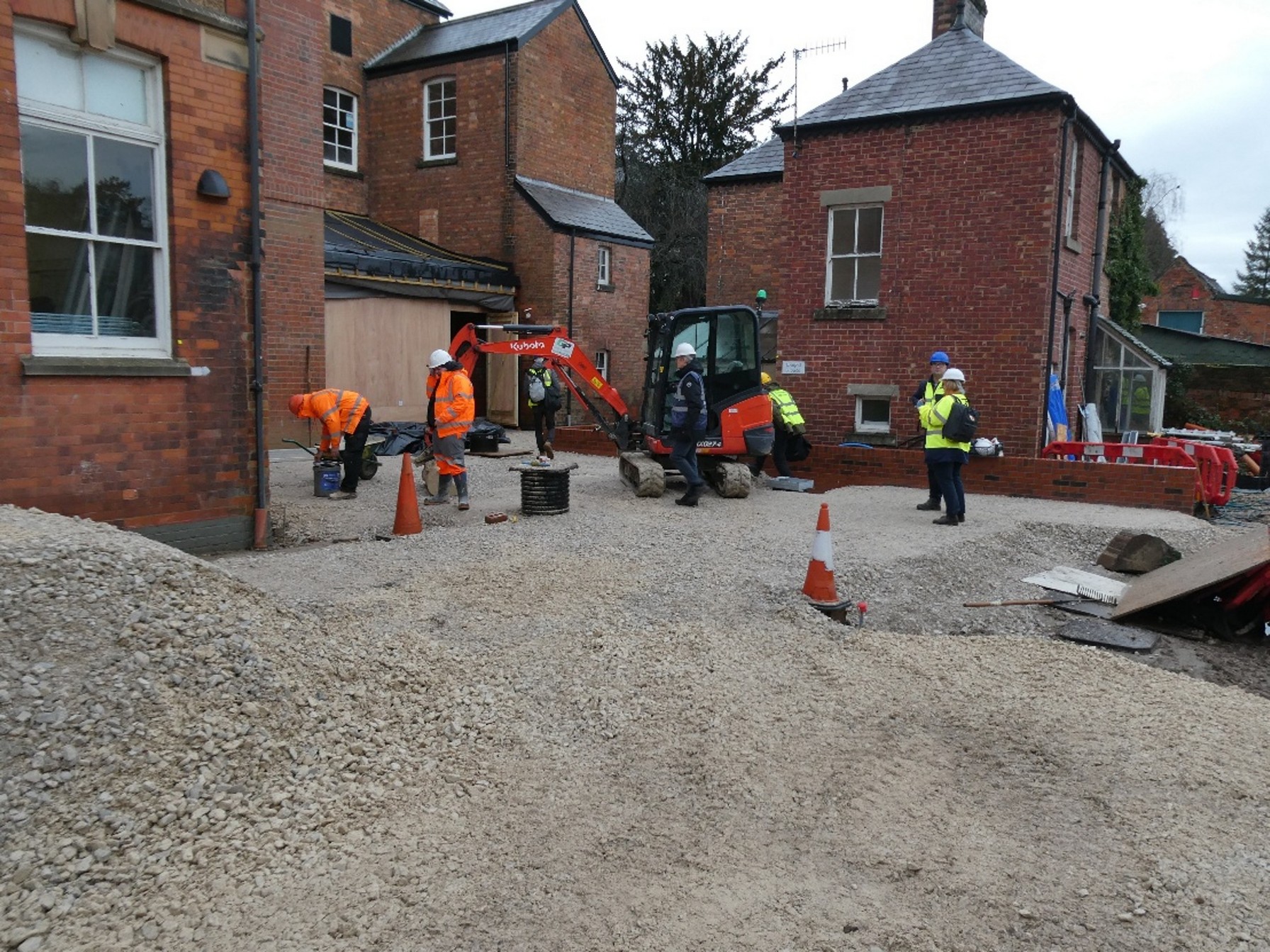 Stone has been laid behind Riverside Hall, the Gateway Extension and the Garden Entrance as a foundation for the new patio area. The stone is the kind gift of Longcliffe quarries